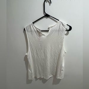 White sleeveless blouse never worn with tags